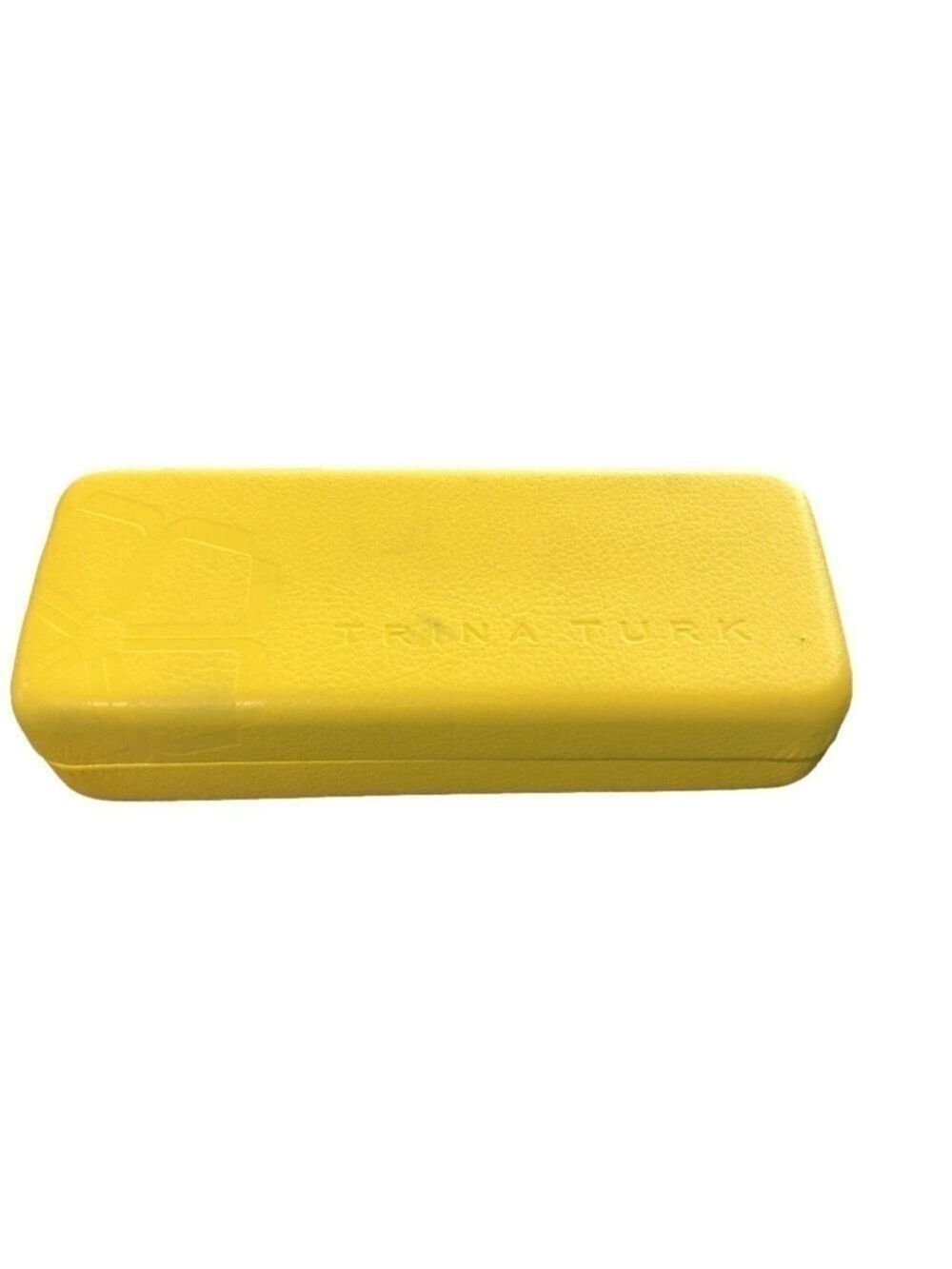 Trina Turk hard shell hinged yellow eyeglasses case.